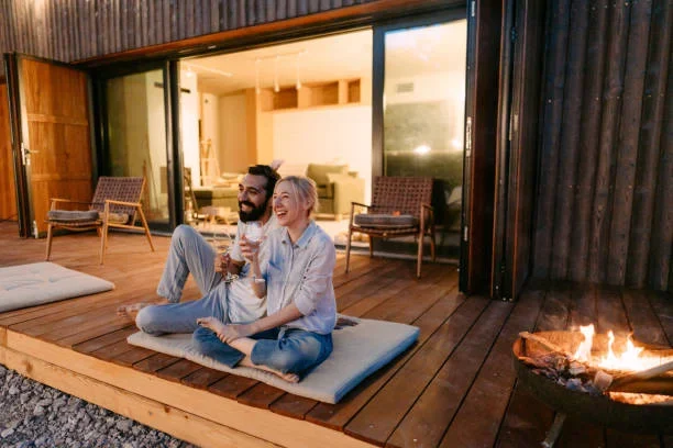 Christchurch couple relaxing on a timber deck