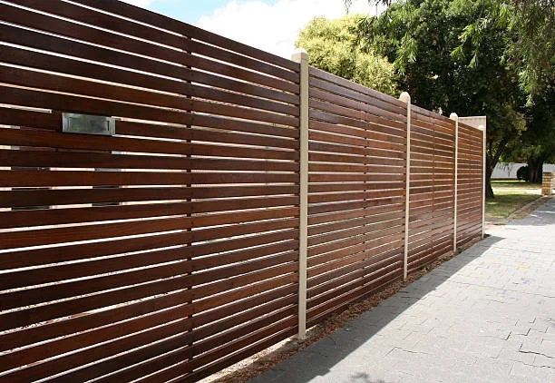 Contemporary slatted timber gate and fence
